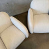 Pair of Vereien Modernist Swivel Chairs in Ivory Boucle