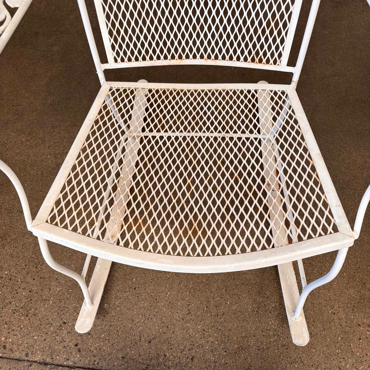 Pair of Wrought Iron Rocking Chairs