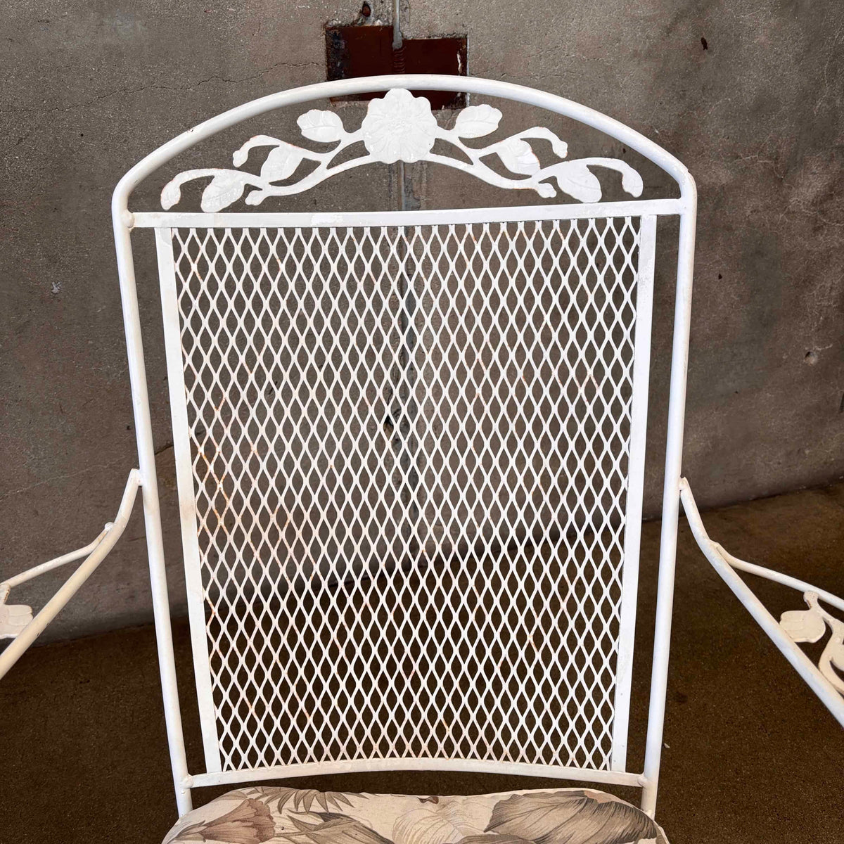 Pair of Wrought Iron Rocking Chairs