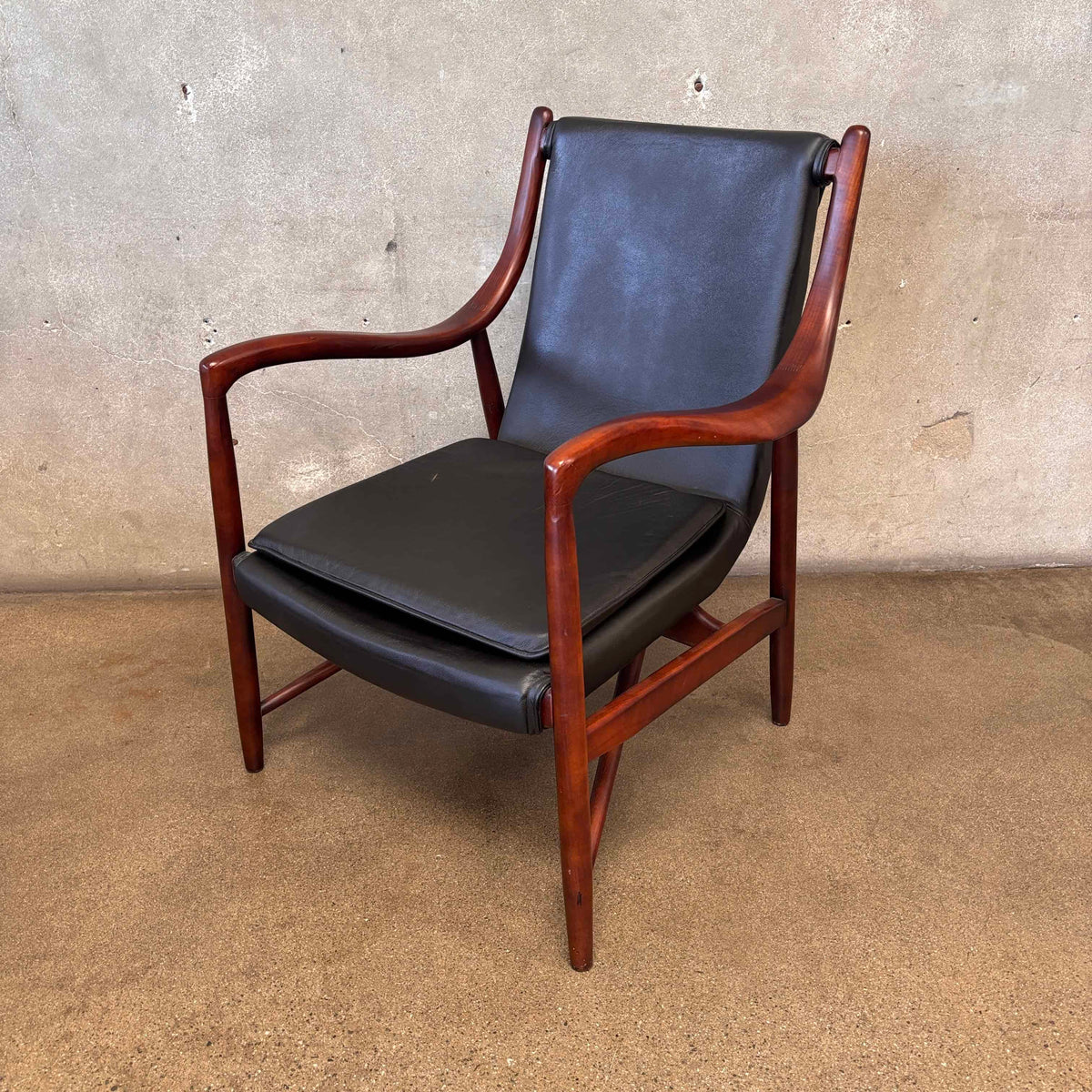 Reproduction Finn Juhl NY-45 Lounge Chair With Sculpted Wood Arm & Floating Leather Seat