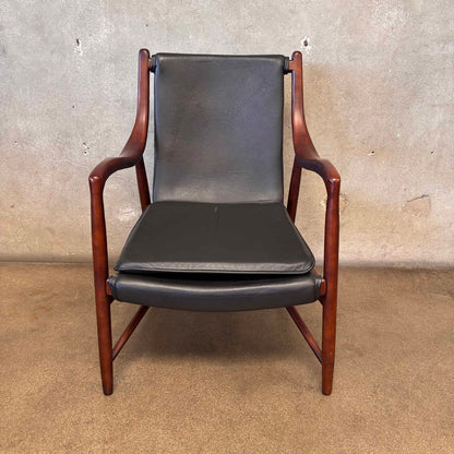 Reproduction Finn Juhl NY-45 Lounge Chair With Sculpted Wood Arm & Floating Leather Seat
