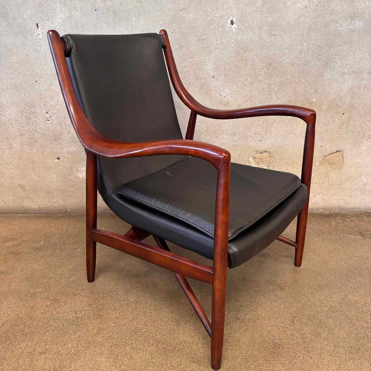 Reproduction Finn Juhl NY-45 Lounge Chair With Sculpted Wood Arm & Floating Leather Seat