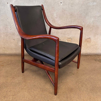Reproduction Finn Juhl NY-45 Lounge Chair With Sculpted Wood Arm & Floating Leather Seat