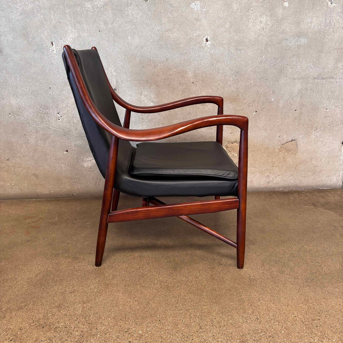 Reproduction Finn Juhl NY-45 Lounge Chair With Sculpted Wood Arm & Floating Leather Seat