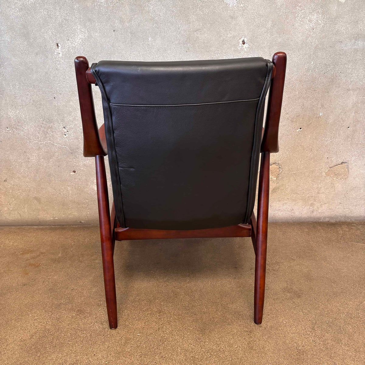 Reproduction Finn Juhl NY-45 Lounge Chair With Sculpted Wood Arm & Floating Leather Seat