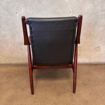 Reproduction Finn Juhl NY-45 Lounge Chair With Sculpted Wood Arm & Floating Leather Seat