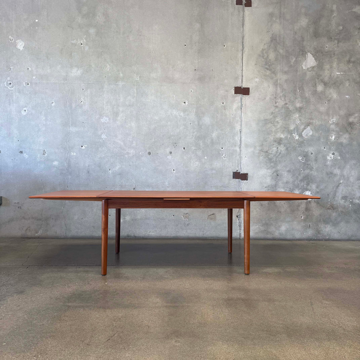 Danish Modern Teak Hidden Leaf Dining Table