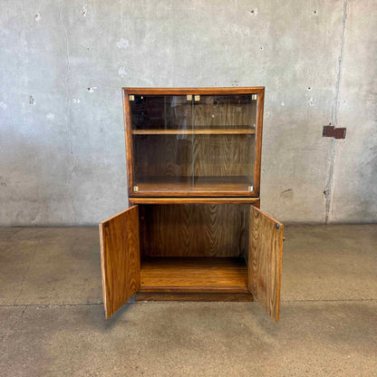 Two Cabinets With Glass Doors
