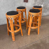 Set of Four Mid Century Modern Bamboo Barstools With Black Vinyl Seats