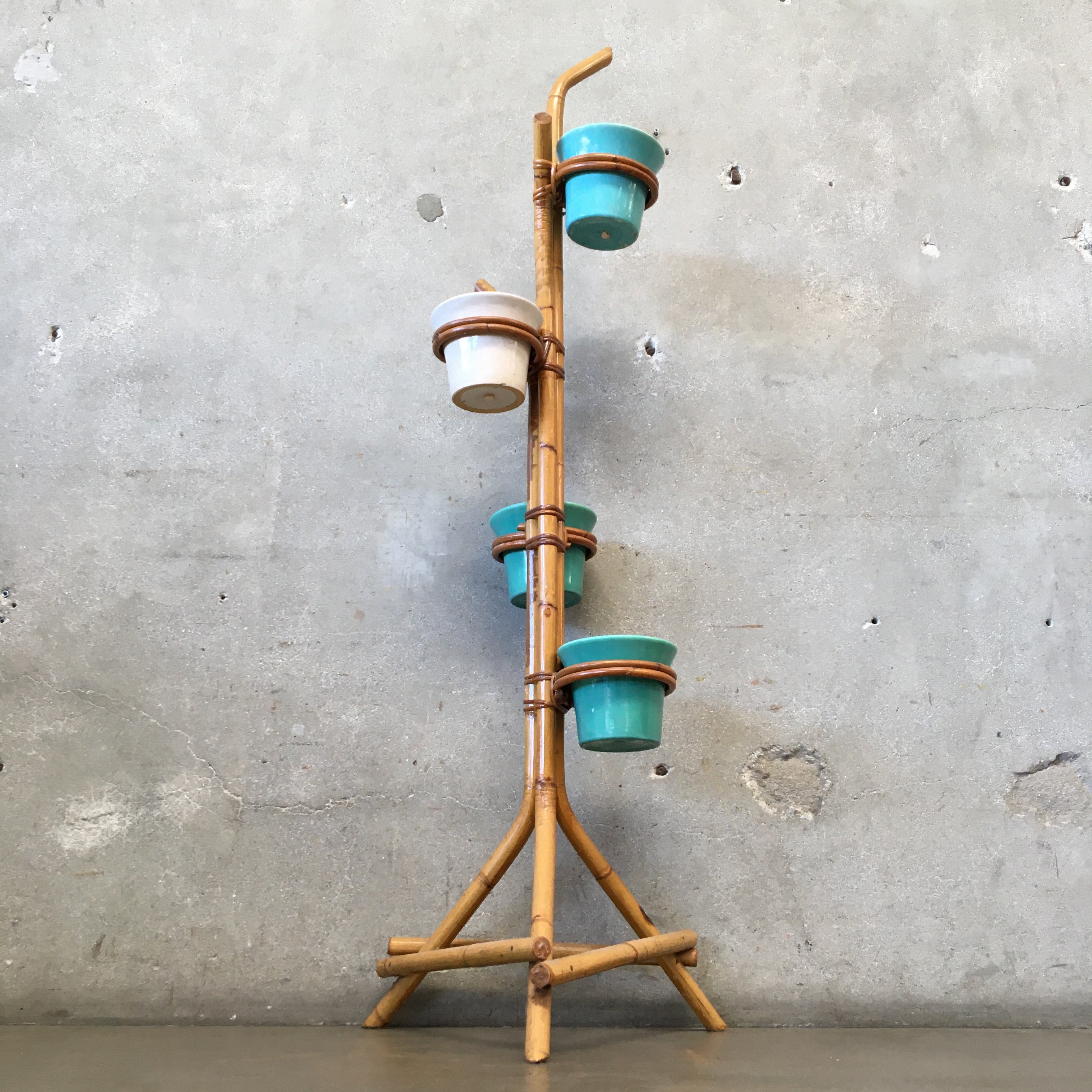 rattan plant pot stand 1940s-1950s Rattan Plant Stand with Four Bauer Pots