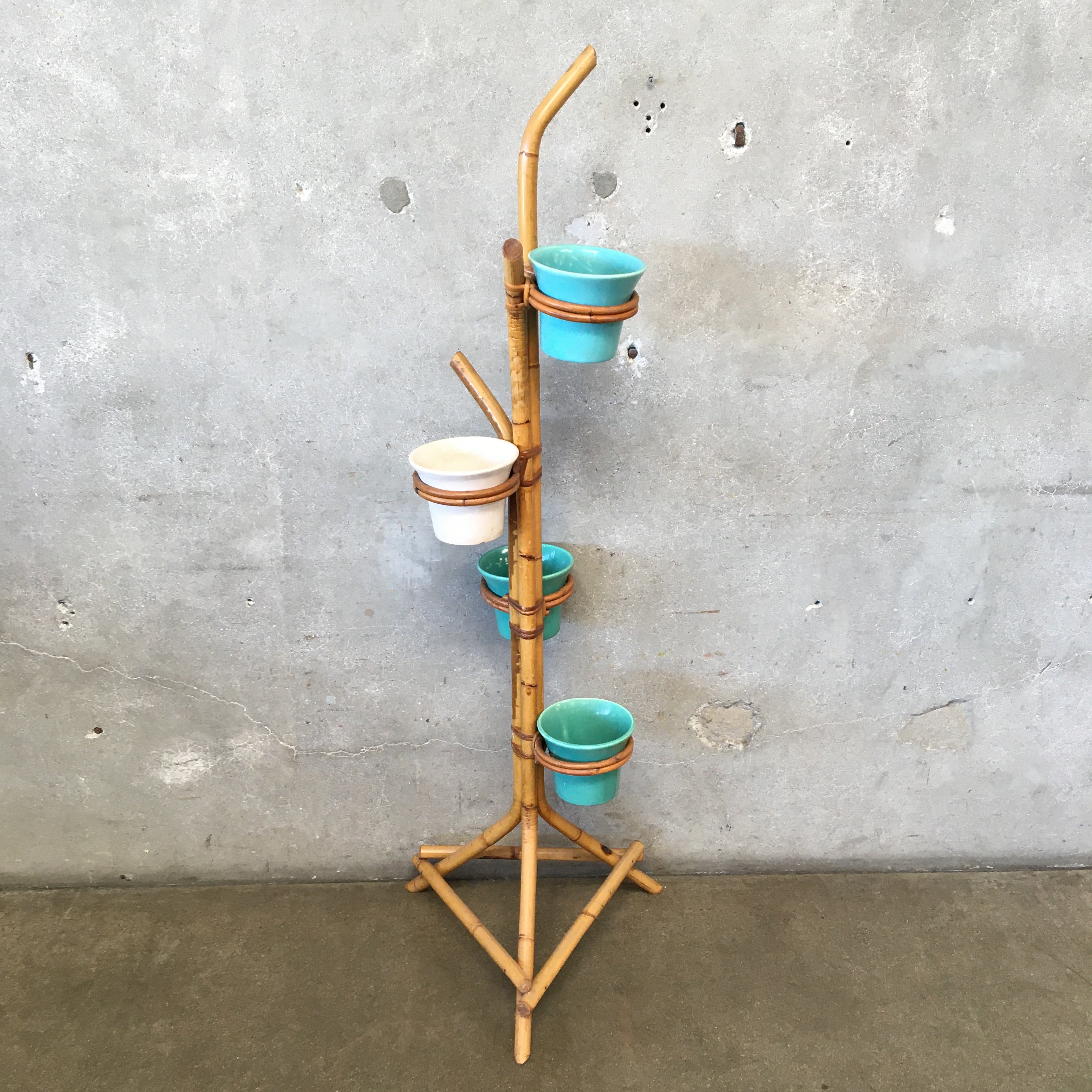 vintage pot plant stand 1940s-1950s Rattan Plant Stand with Four Bauer Pots
