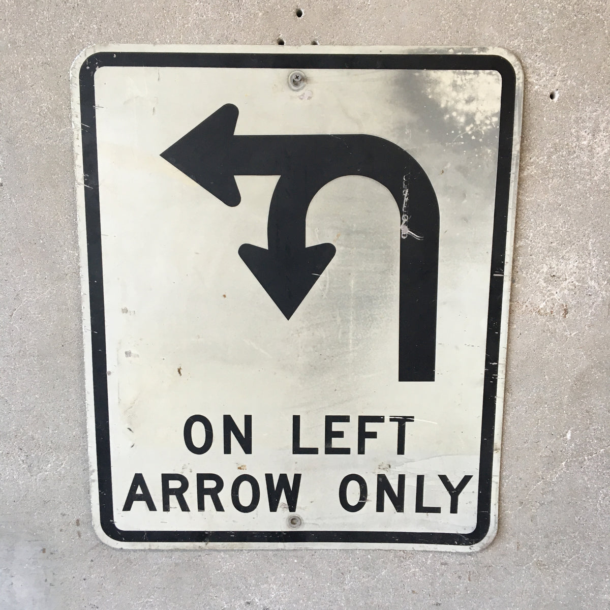U-Turn On Left Arrow Only Sign