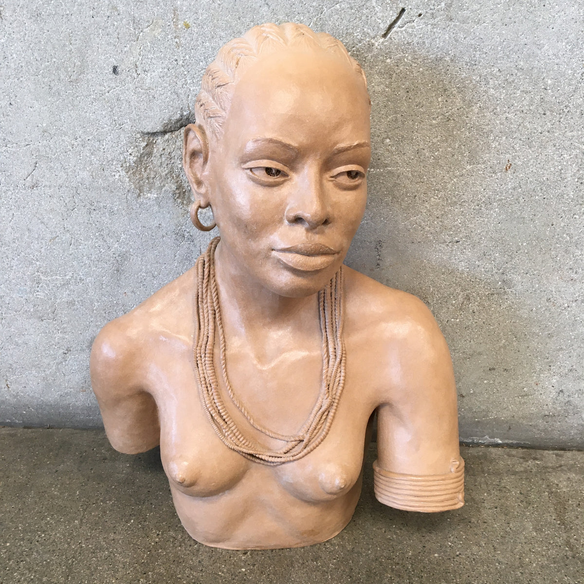 African Tribal Studio Pottery of a "Braided Woman" by C. Nelson