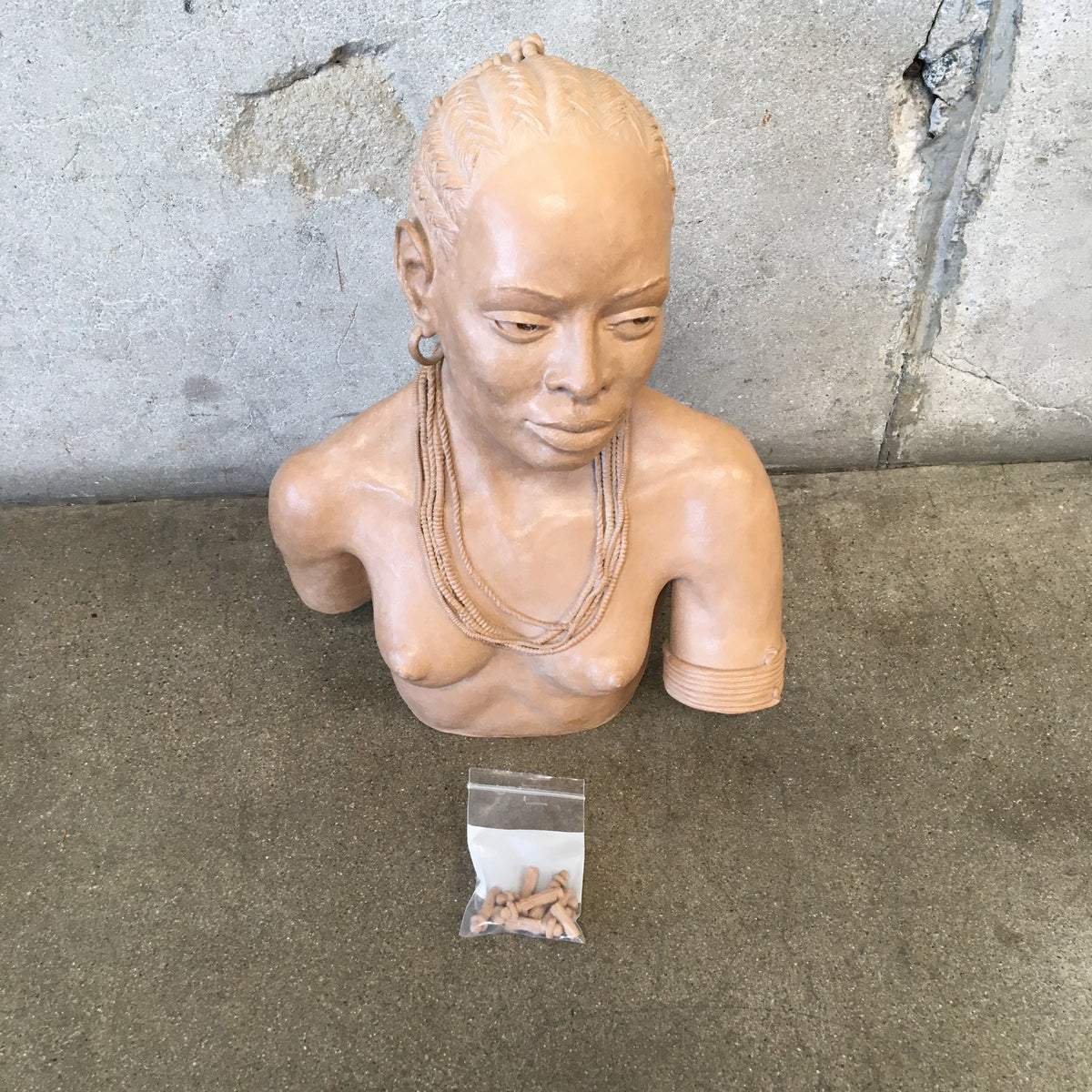 African Tribal Studio Pottery of a "Braided Woman" by C. Nelson
